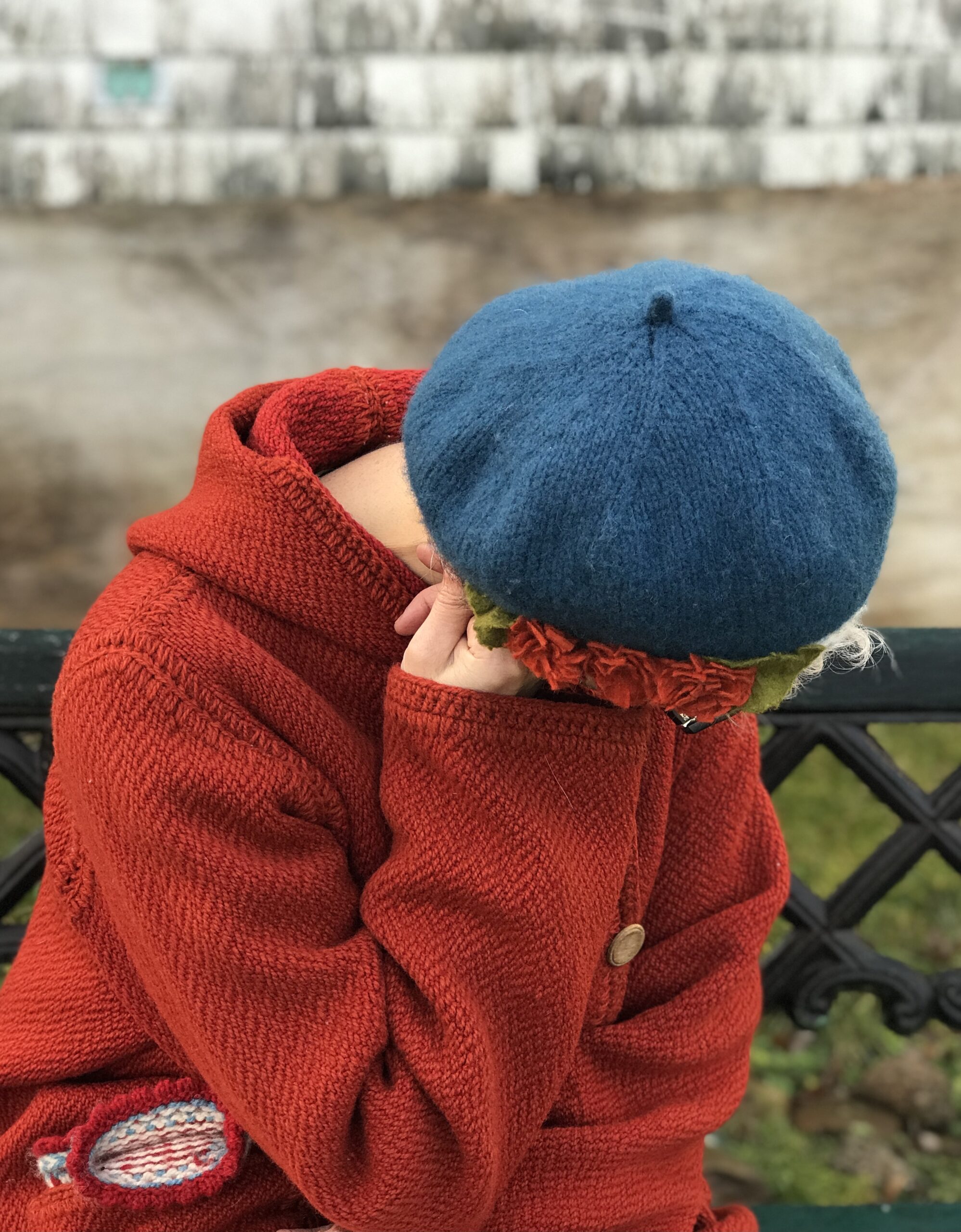 orange and blue beret